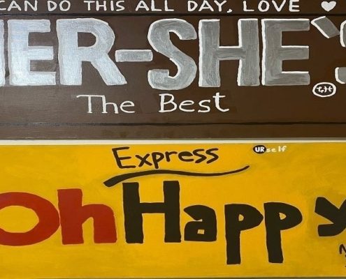 An art painting that reads, "I can do this all day, love Her-She's. The Best." And, another print that reads, "Express. Oh Happy!"